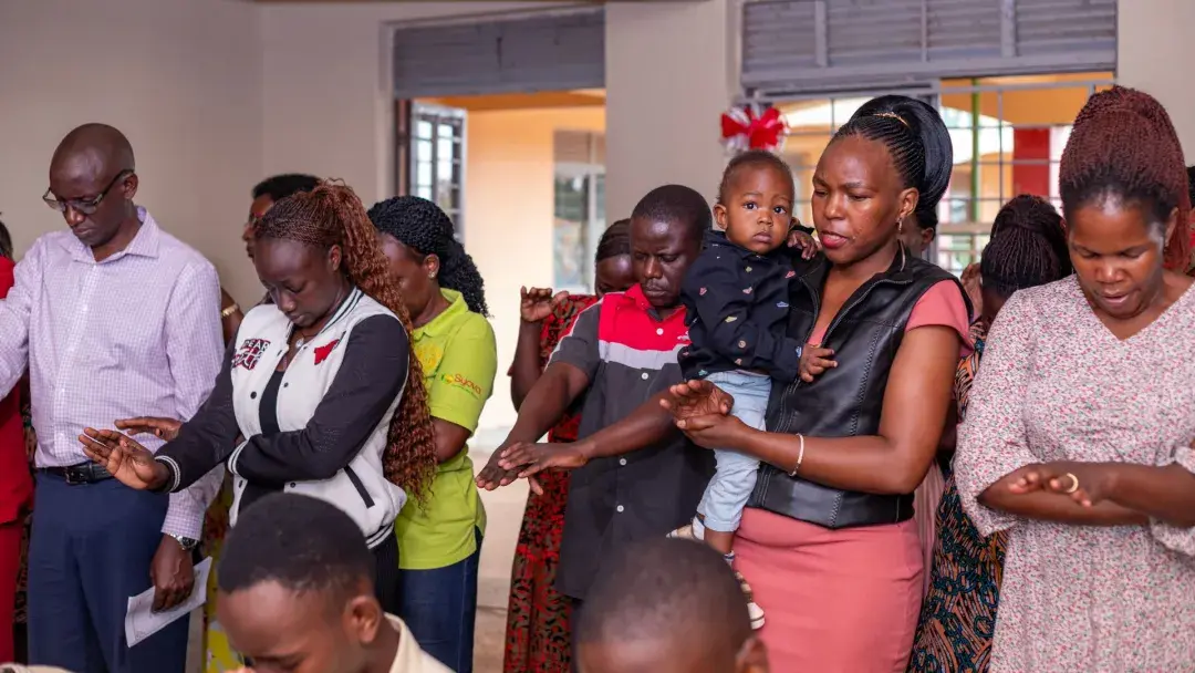 Parents praying for candidates