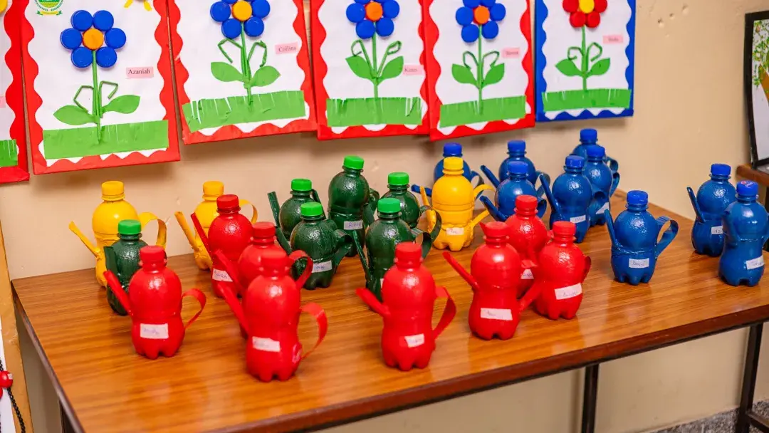 Watering can and flowers