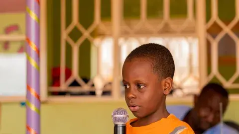 Aine talking about a watermelon