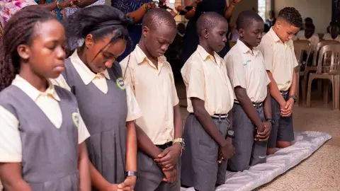 Parents praying for candidates