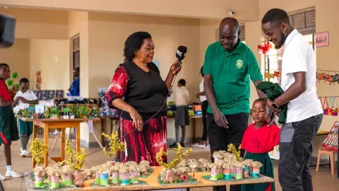 Eseza Omutto interviewing the HM