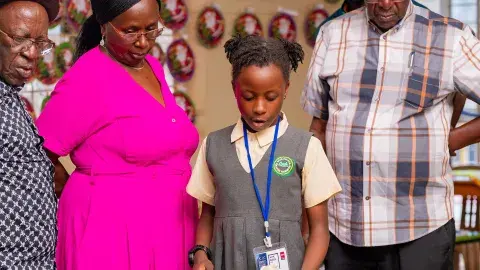 Guest of honor appreciating handwork