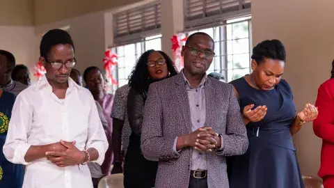 Parents praying for candidates