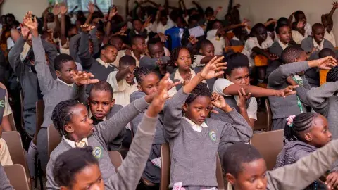 Pupils praying for candidates