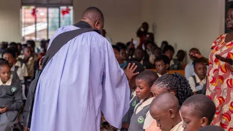 Rev. Noah dedicating candidates