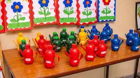 Watering can and flowers