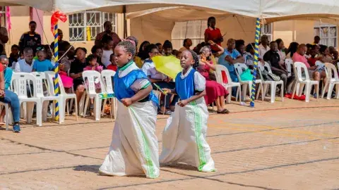 Sack race and button fixing